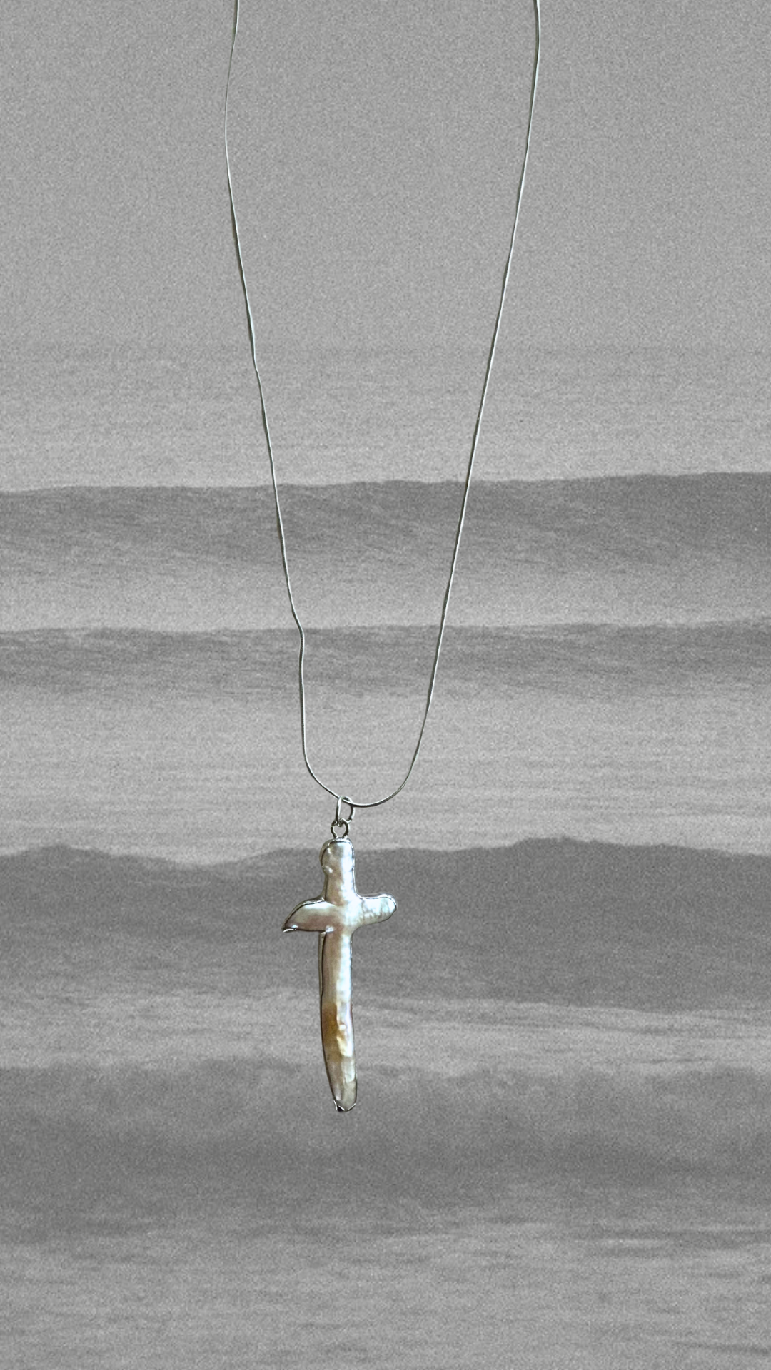 CROSS NECKI